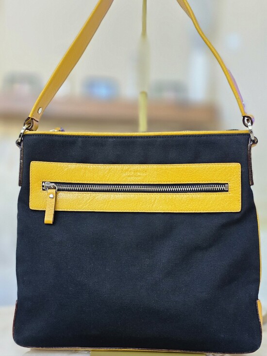 kate spade Handbags - Kate Spade New York Black Canvas Yellow Leather Trim Messenger Crossbody.